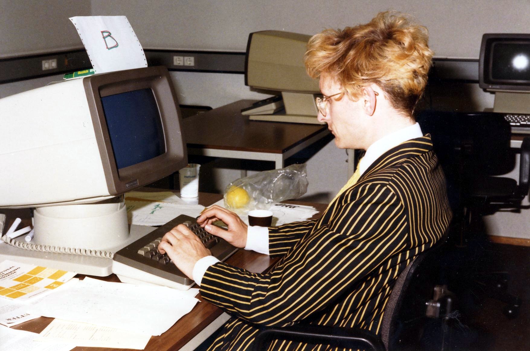 Steven at a computer in the 80's
